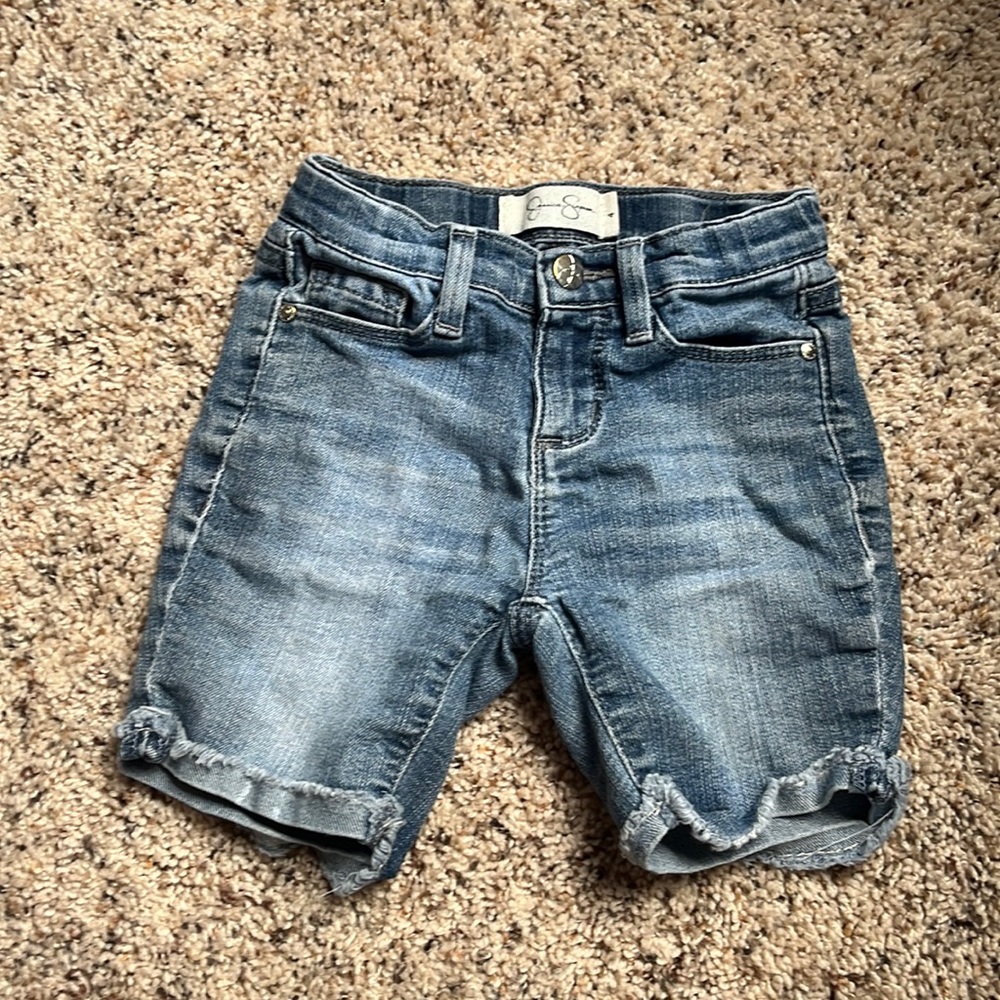 These are girls 4T Jessica Simpson adjustable shorts.